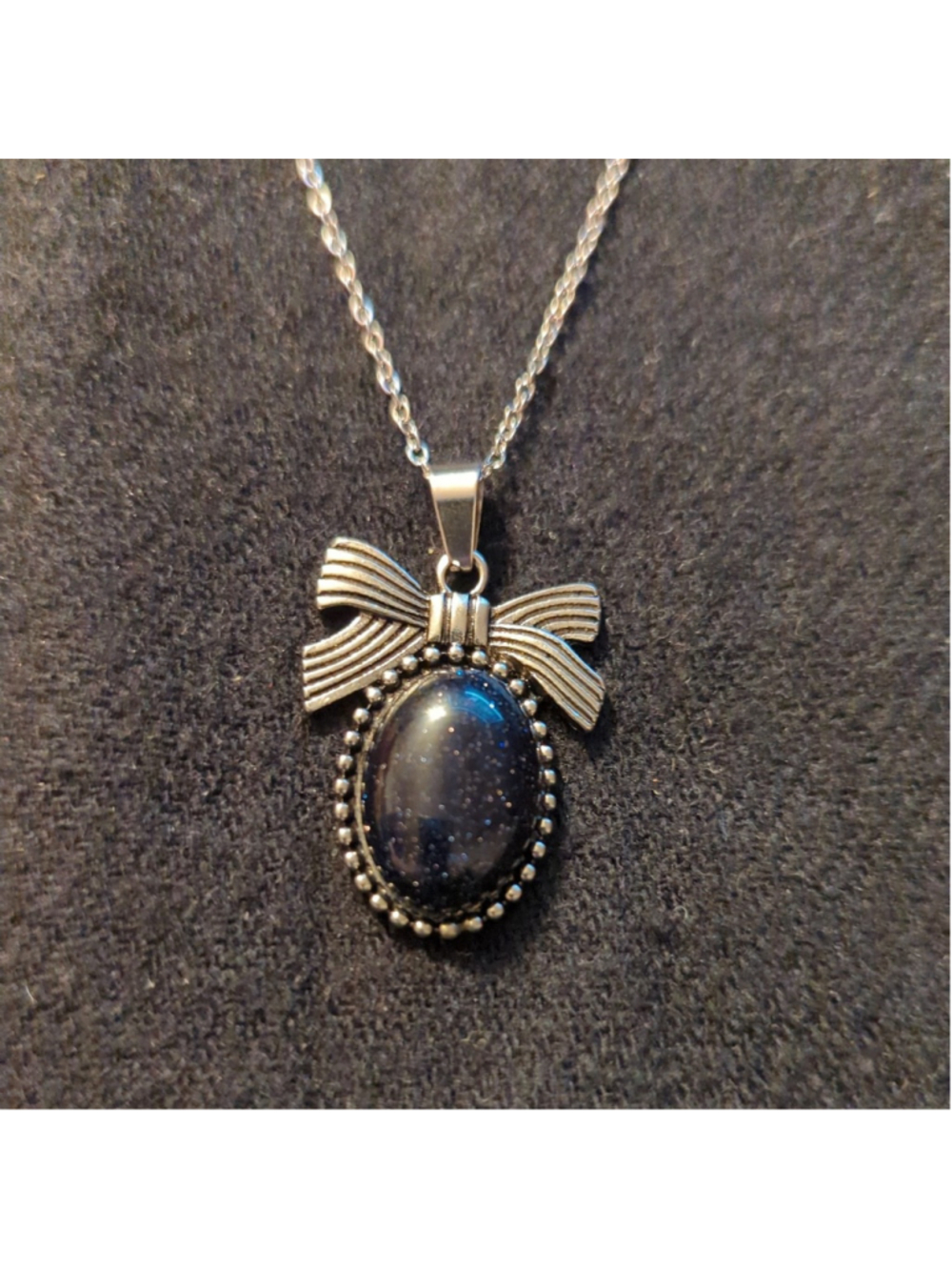 Silver Tone Blue Goldstone Gemstone Bow Pendant Statement Necklace